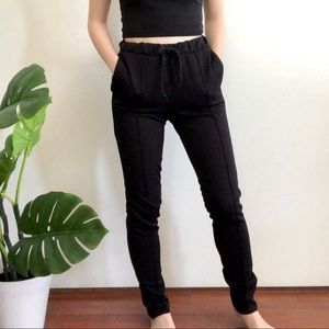 Black sweatpants from Brashy Studios